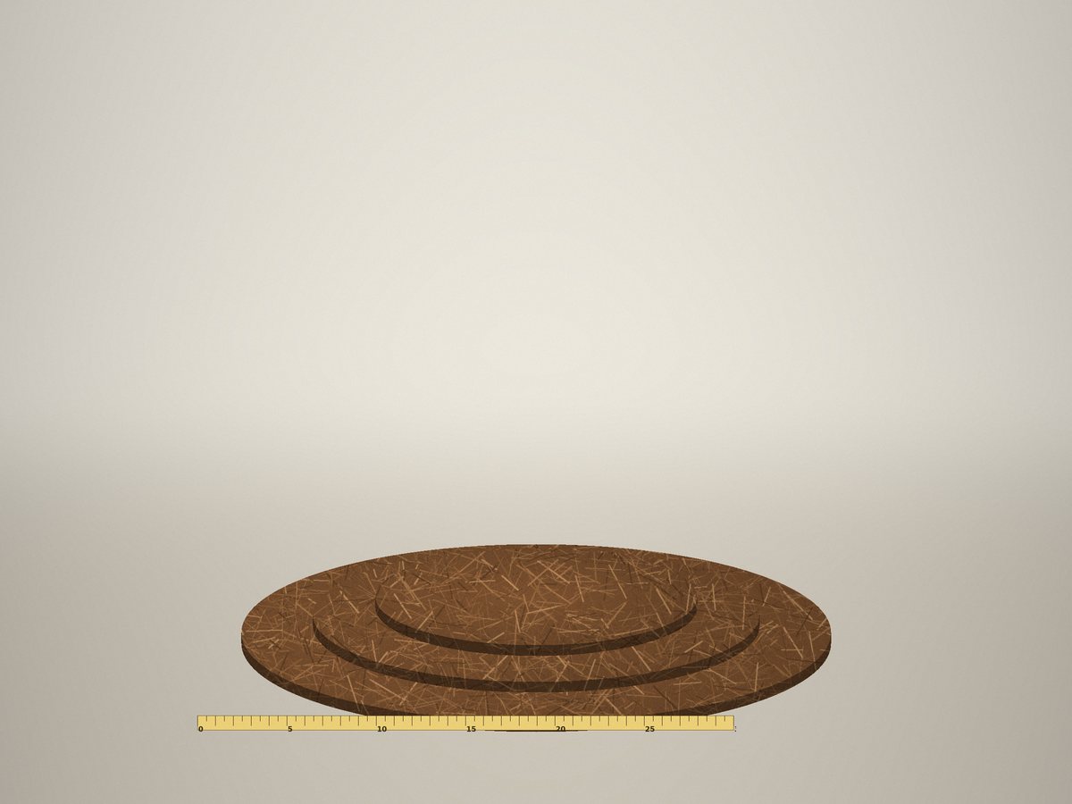 Stack of coir mulch discs in three sizes with a ruler
